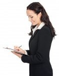 12586551-happy-smiling-young-beautiful-business-woman-with-clipboard-writing-isolated-over-white-background